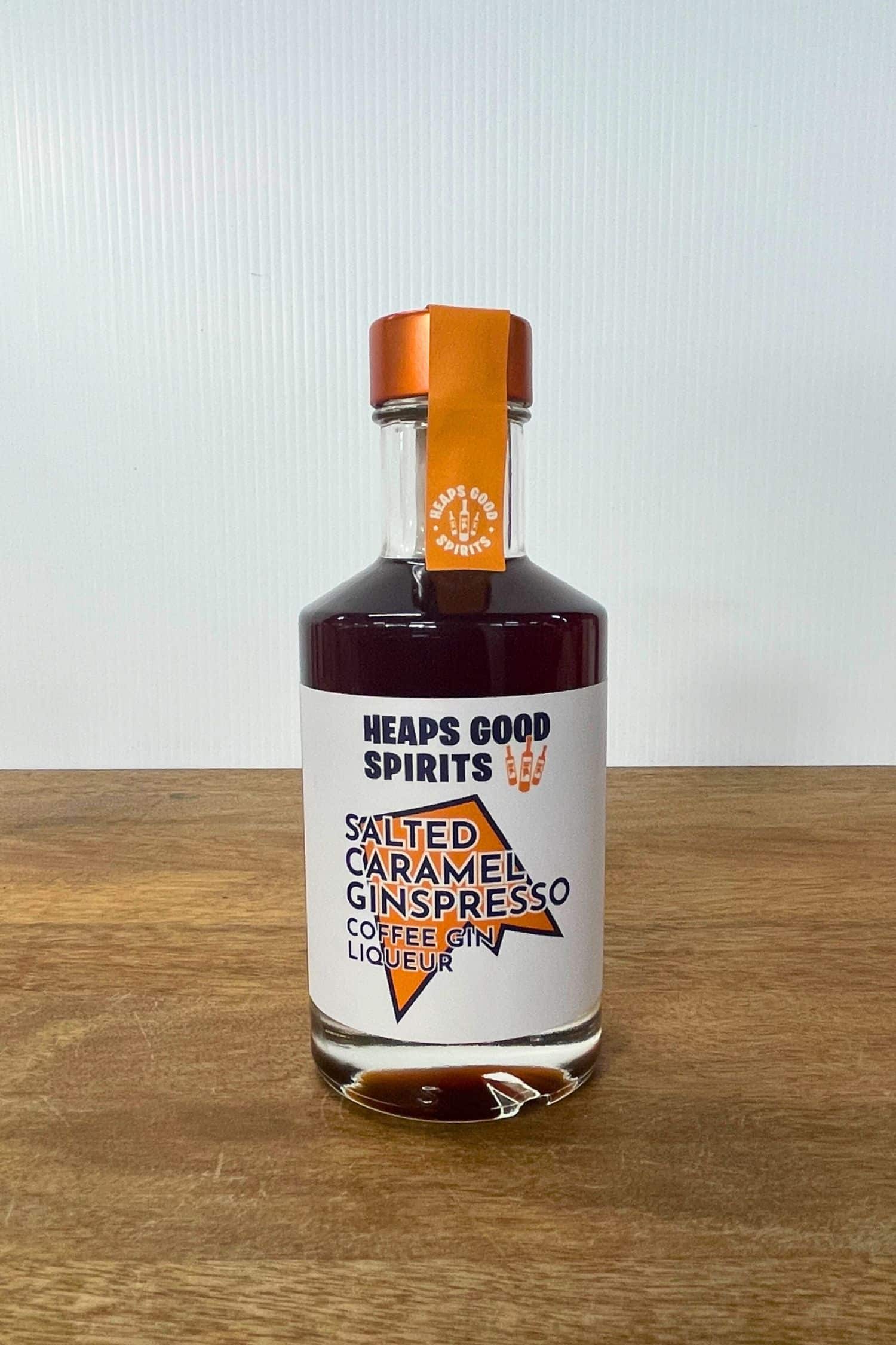 Heaps Good Spirits Salted Caramel Ginspresso Coffee Gin Liqueur bottle on wooden surface
