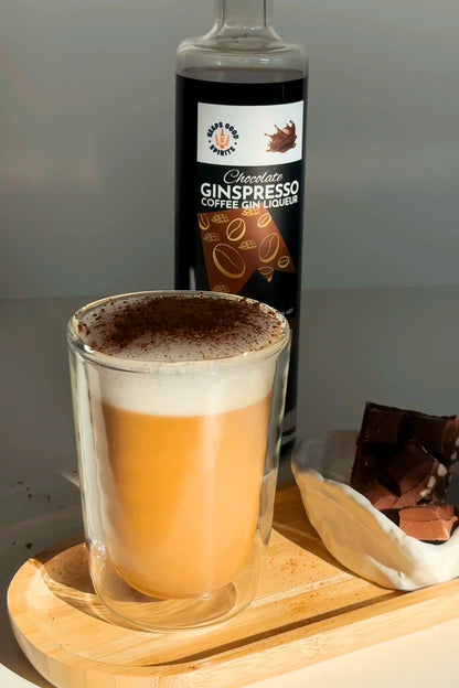 Chocolate Ginspresso coffee gin liqueur with creamy chocolate coffee drink and cocoa dusting.