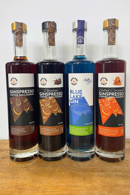 Ginspresso coffee gin liqueur range with Chocolate, Original, Salted Caramel and Blue Lake Gin bottles