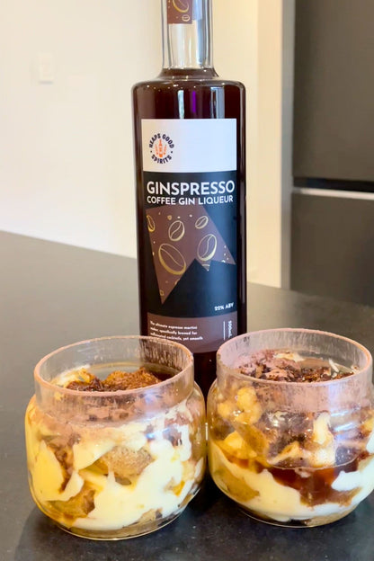 Bottle of Ginspresso coffee gin liqueur with two single servings of gin tiramisu made using it.