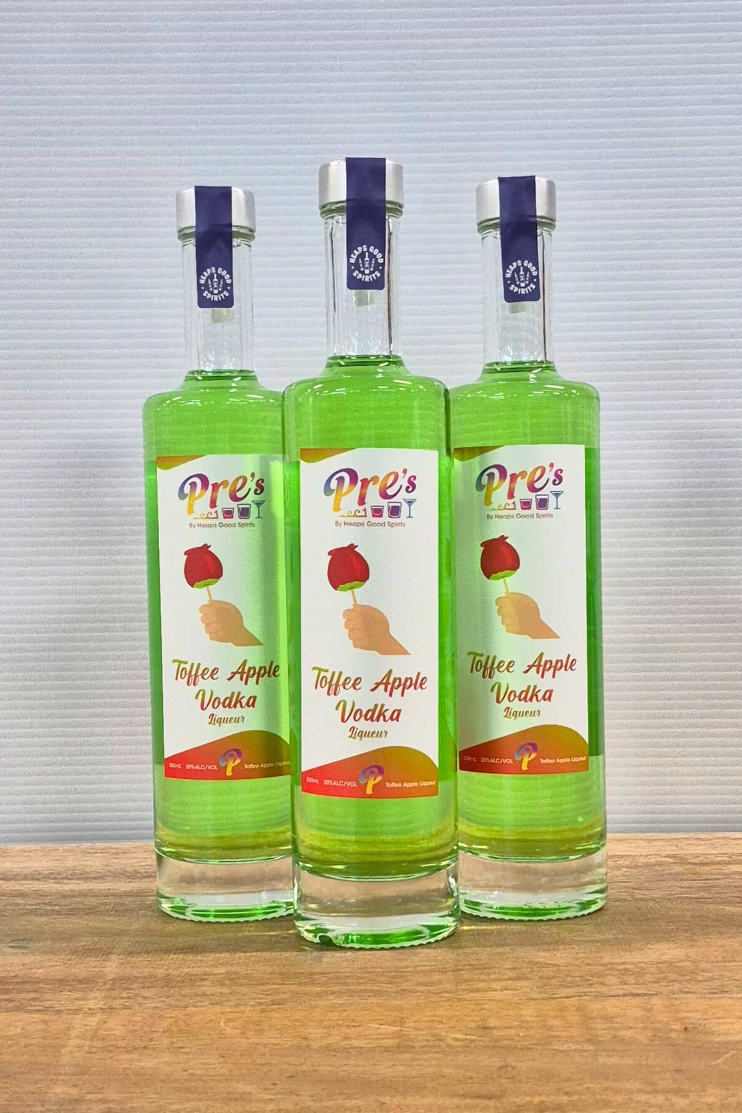 3 Voddi’s Toffee Apple flavoured vodka liqueur 500ml bottles grouped together