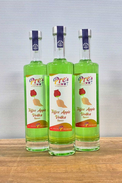 3 Voddi’s Toffee Apple flavoured vodka liqueur 500ml bottles grouped together